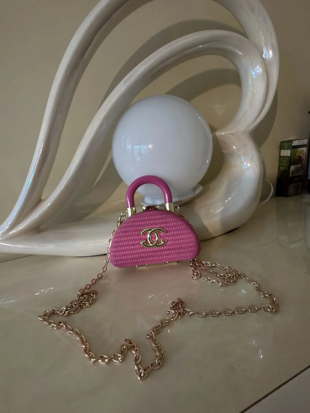 Chic  Pink Mini Dome Crossbody Clutch with Gold Chain.